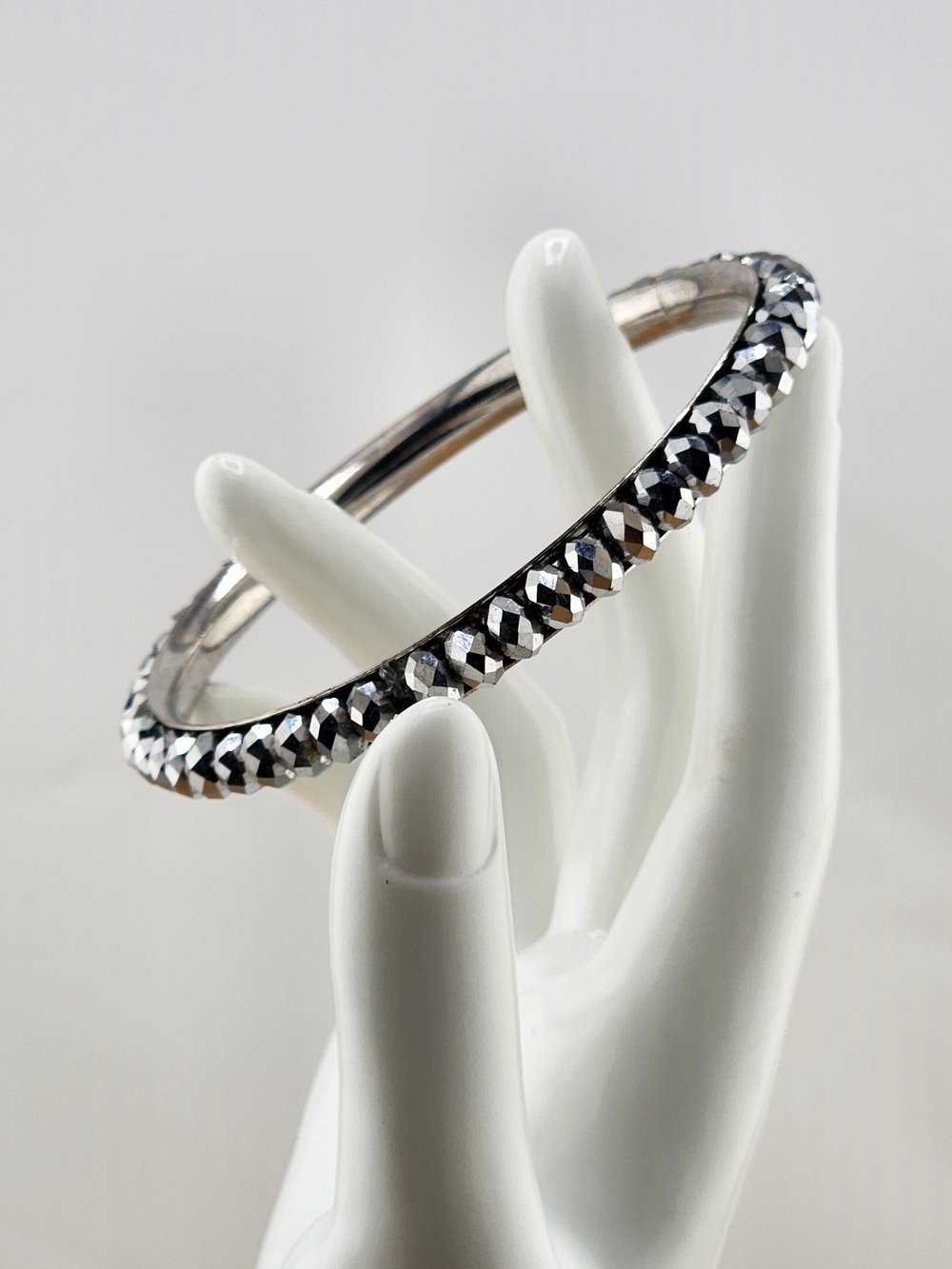 8.25in Silver Tone Faceted Crystal Bangle Bracelet - C03